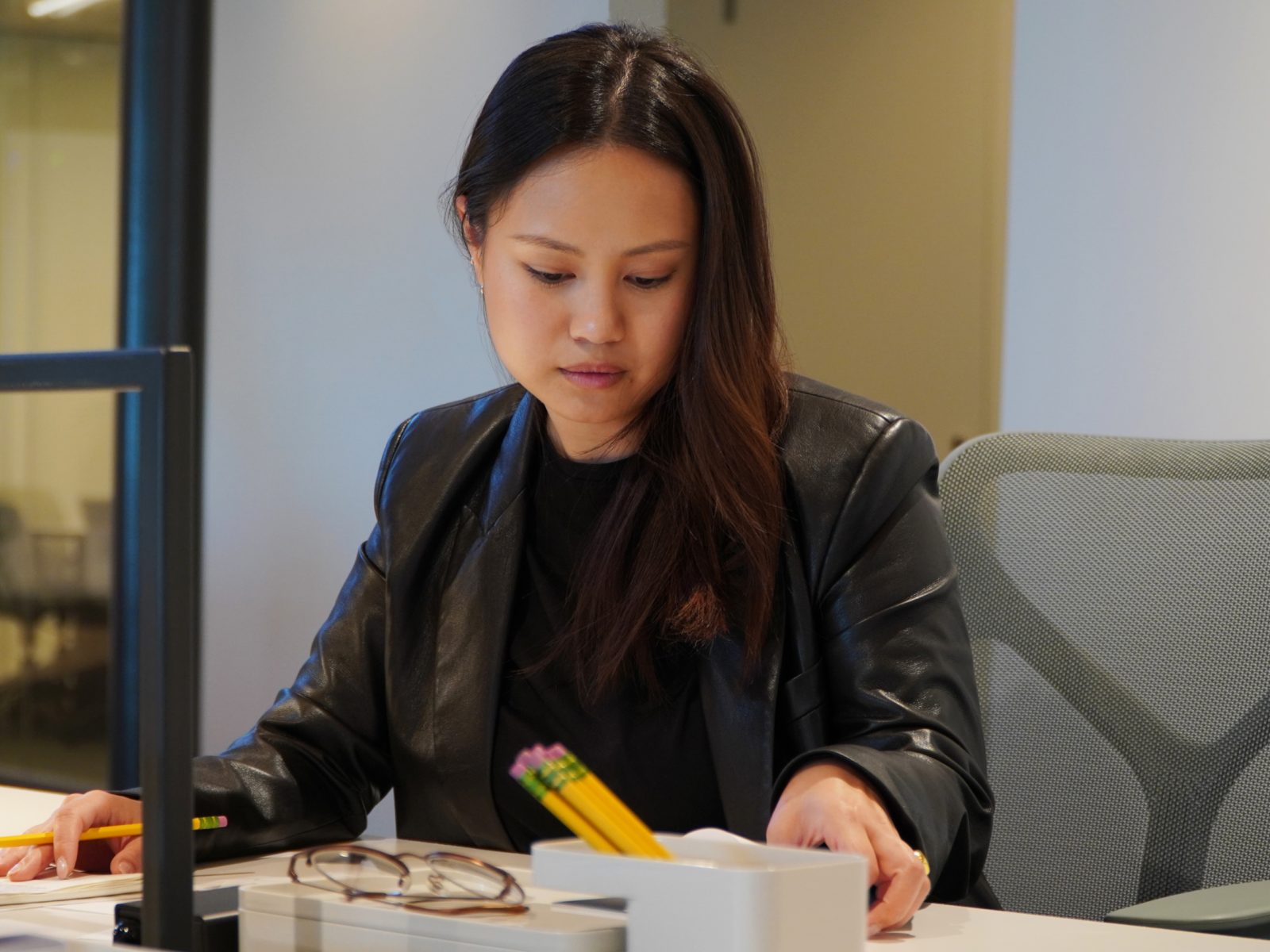 Lady working at her desk.