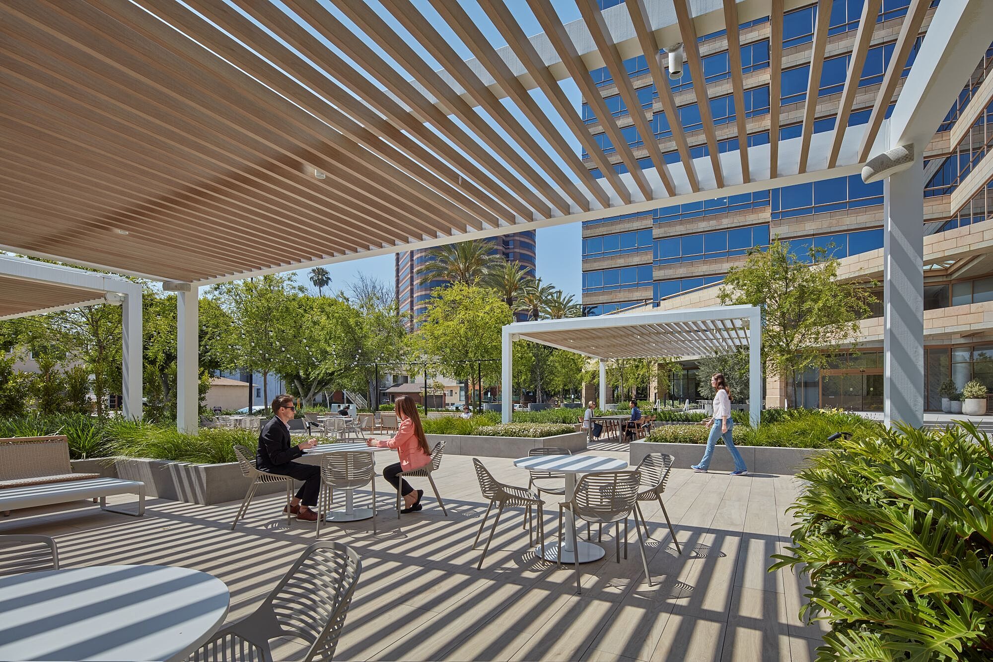 Outdoor collaborative seating and tables at Studio Plaza