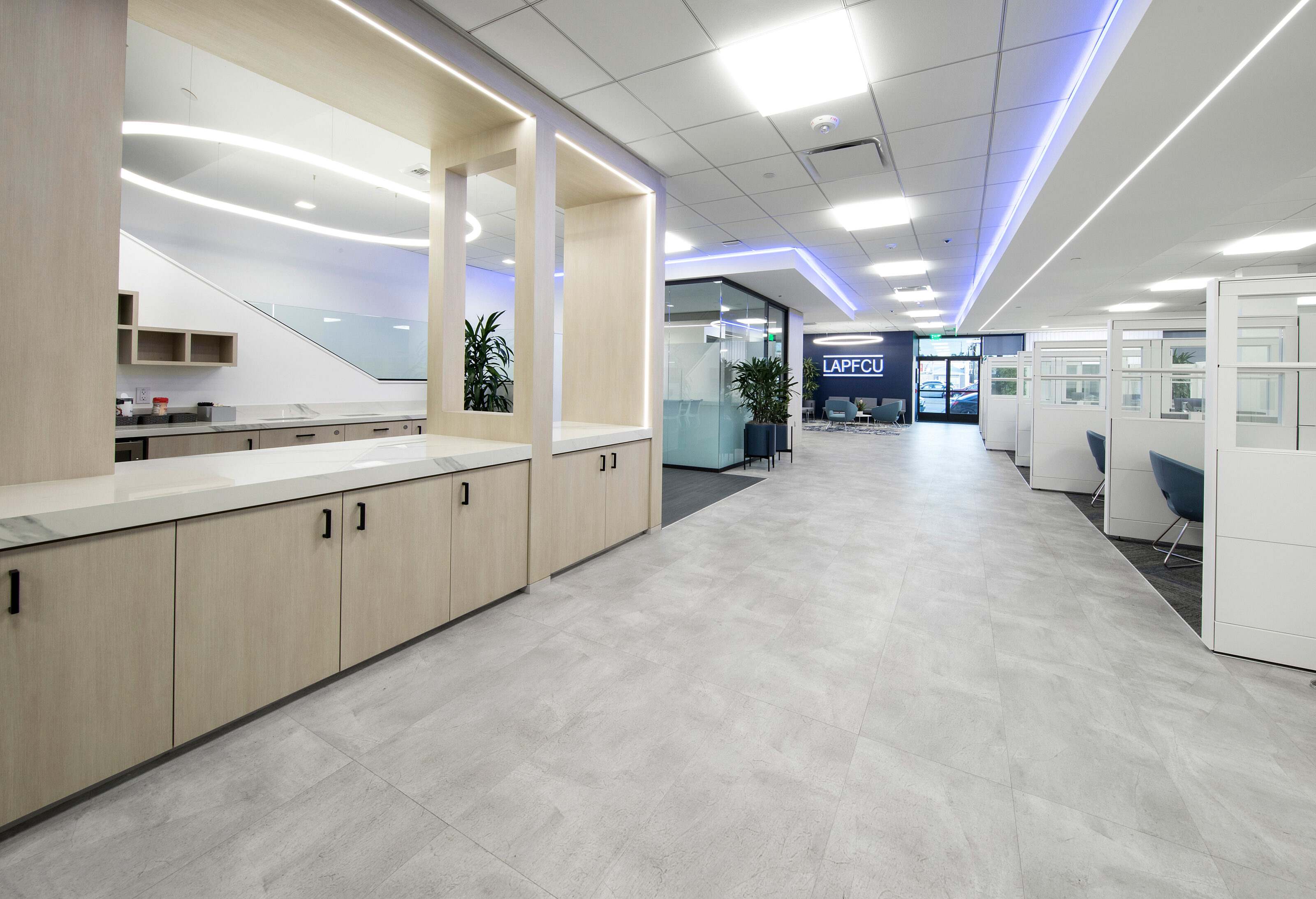 A corridor connects the break room and the bank counters.