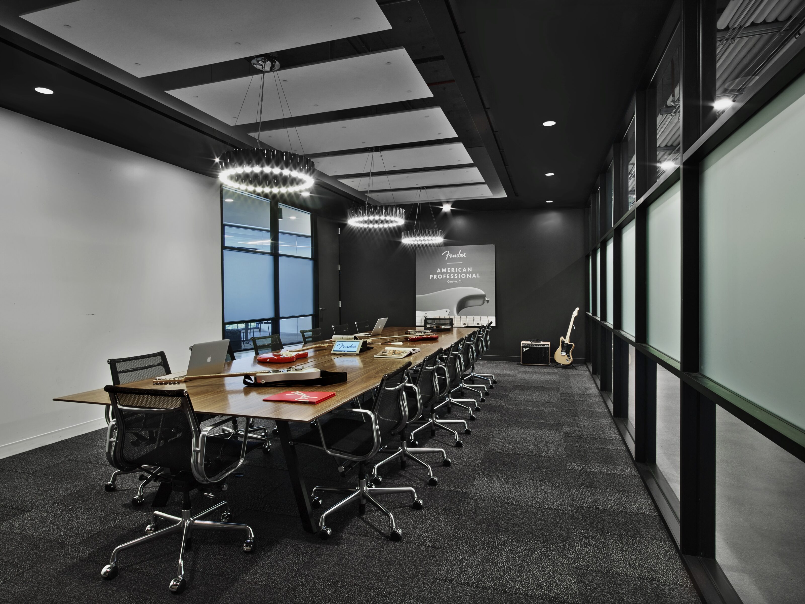 Conference room with office chairs and conference table.