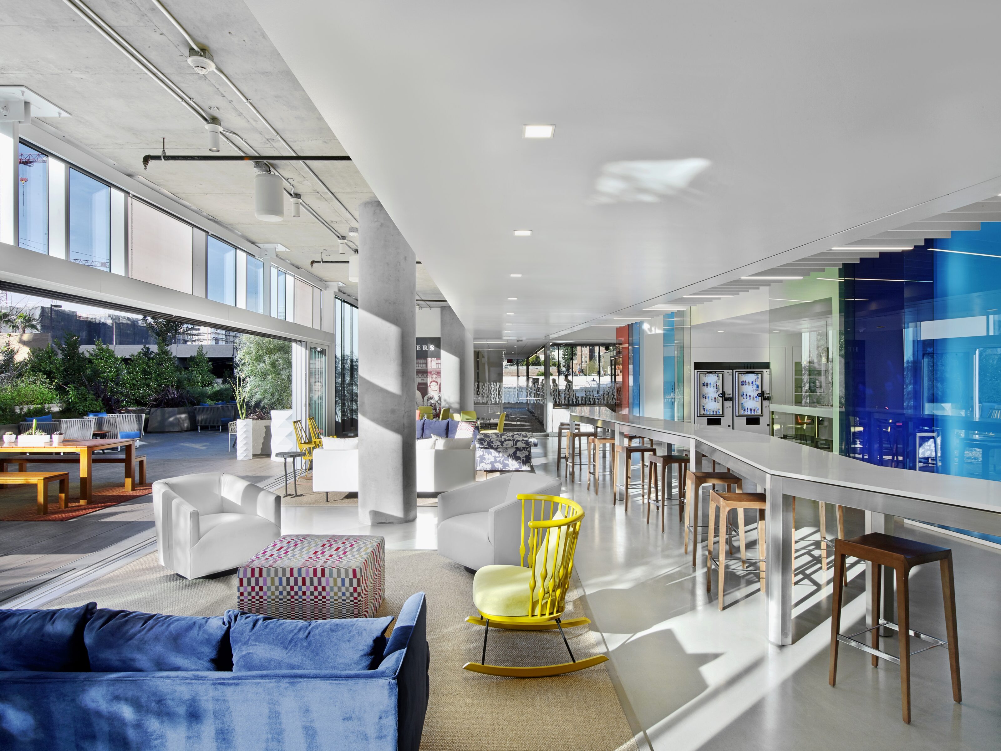 A versatile open area with flexible seating options, providing a conducive environment for people to work in diverse groups and collaborate effectively.